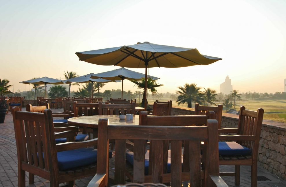 empty tables and chairs in the morning